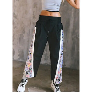 NEW FREE PEOPLE FP MOVEMENT BLACK PRINTED CHAMP IS HERE PANTS SZ XS